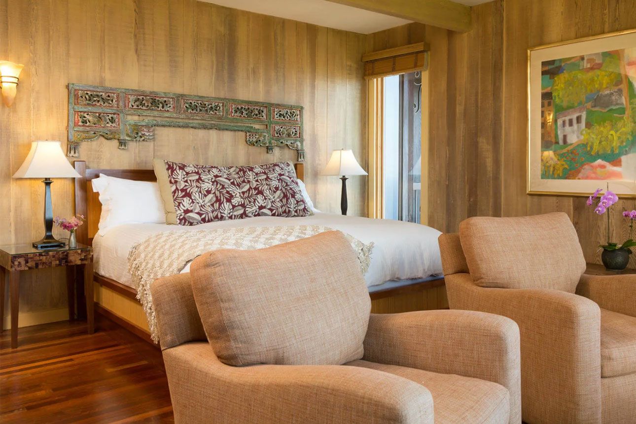 Hibiscus Room-armchairs in bedroom.