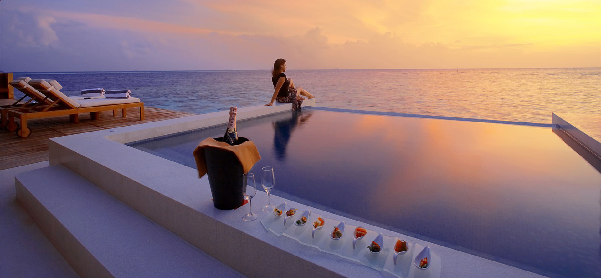 Maldives honeymoon sunset and swimming pool.