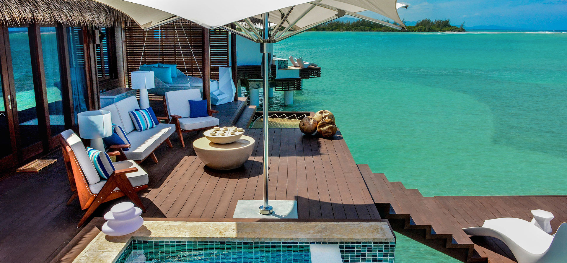 Bahamas overwater bungalow with pool.