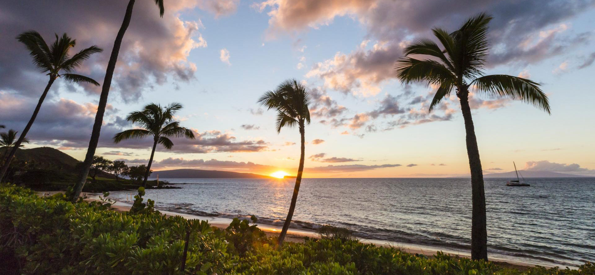 Overwater bungalows hawaii sunset.