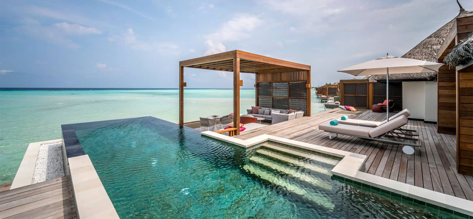 Swimming pool in overwater bungalow in Maldives.
