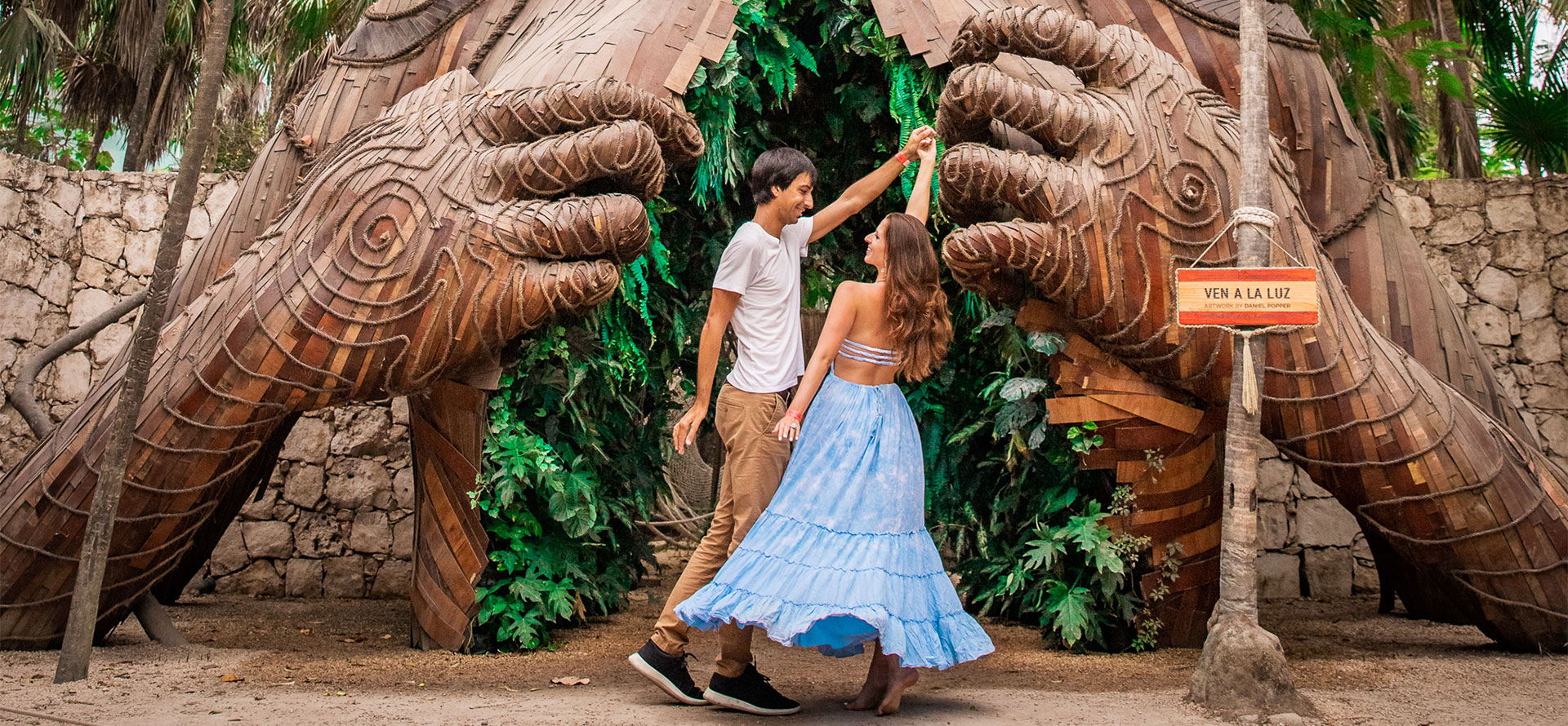 Couple dancing at tulum or cabo san lucas.