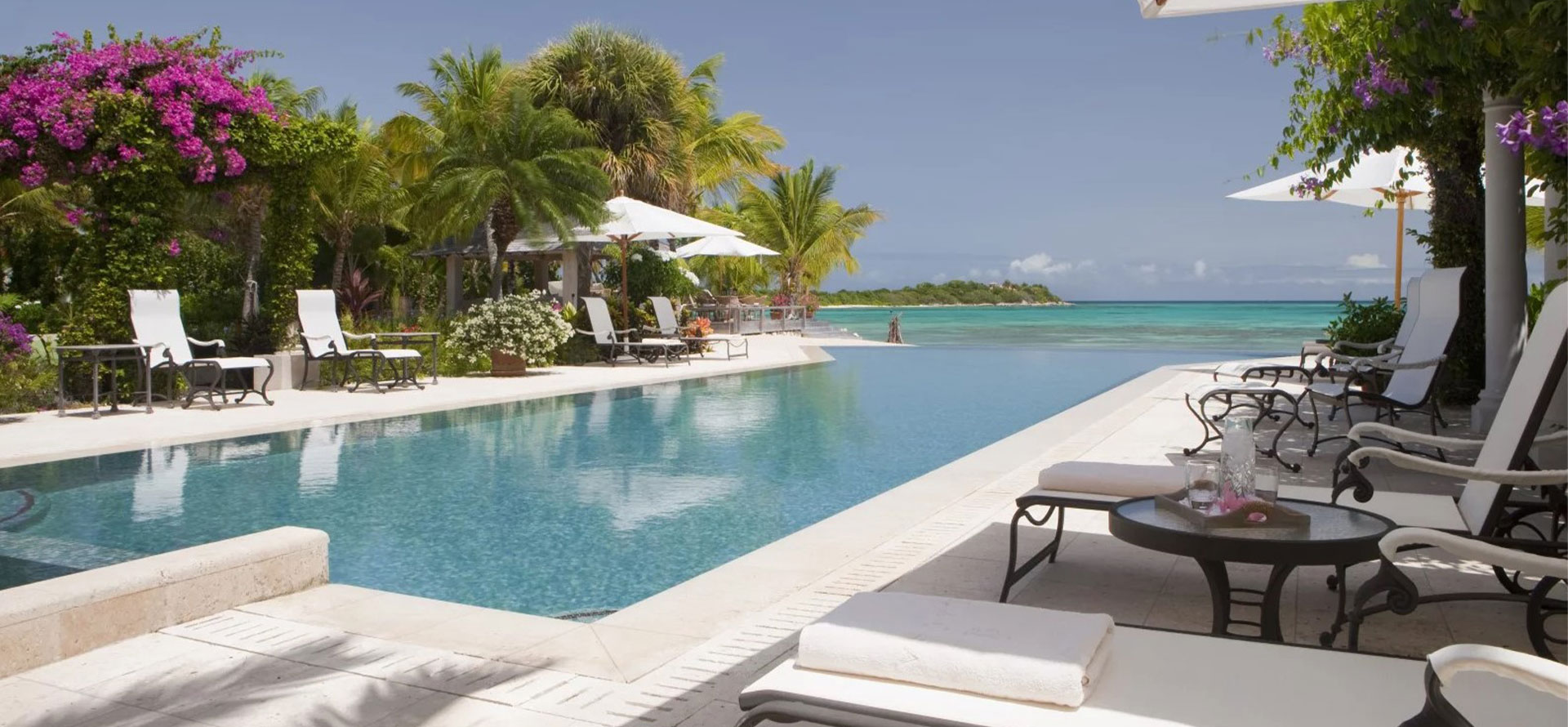 Antigua luxury resorts with ocean view pool.
