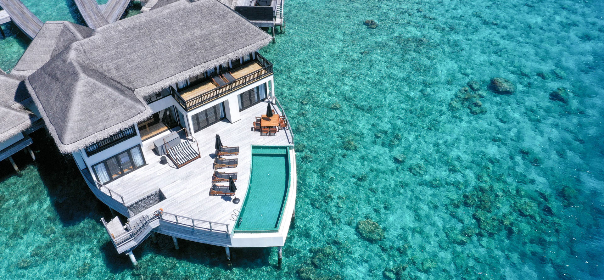 Thailand overwater bungalows with swimming pool.