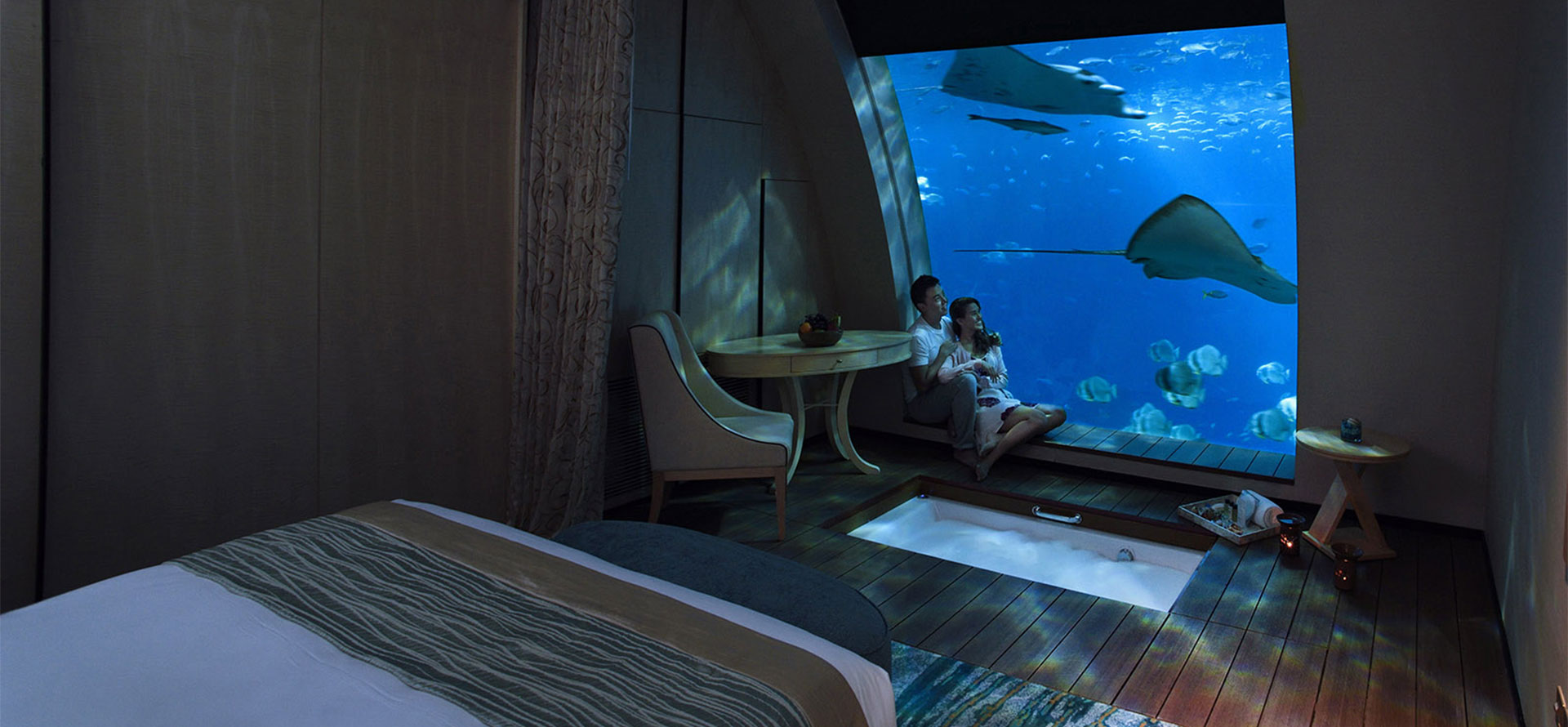 Couple in underwater room at St Lucia.