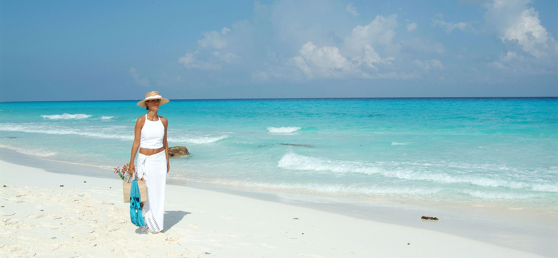 Woman on the best beach in Cancun.
