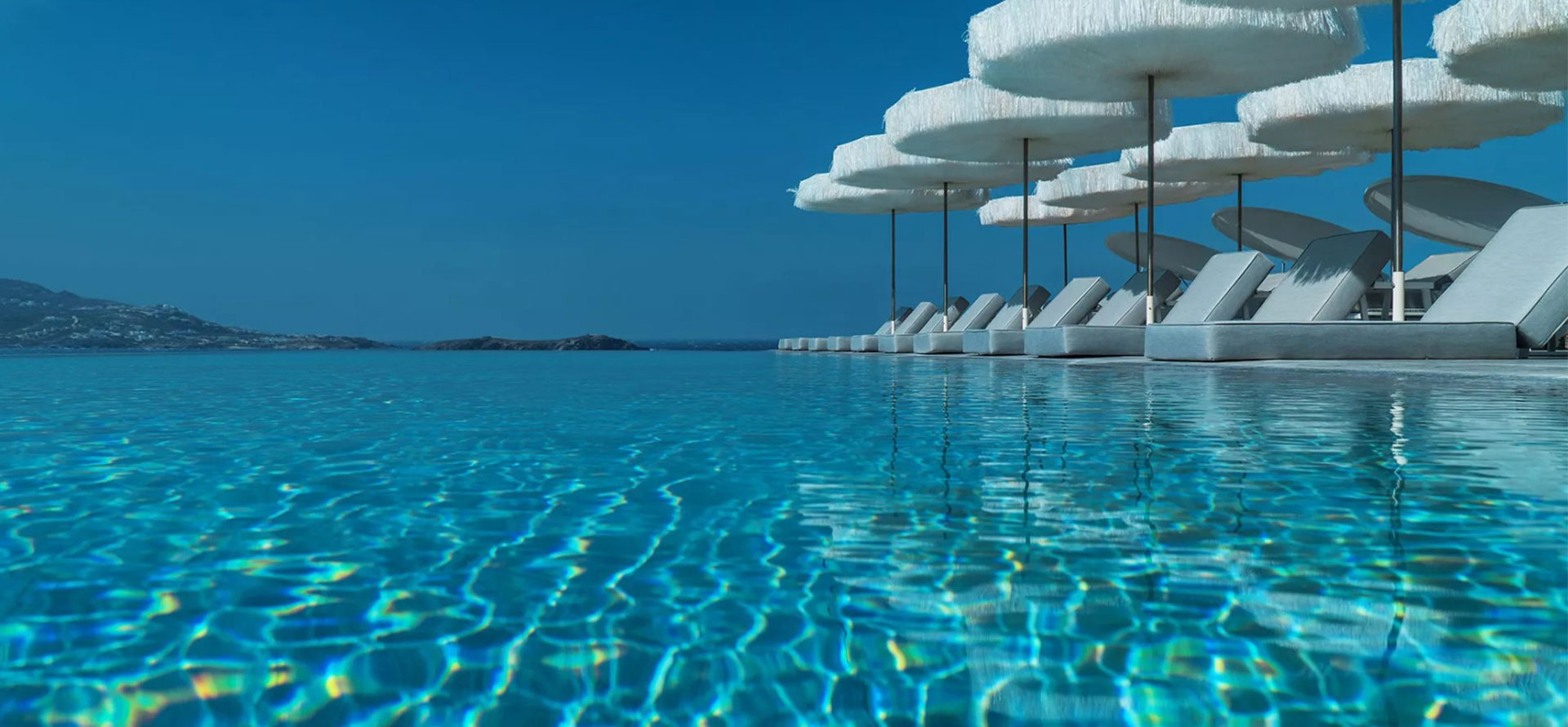 Poolside lounger in Mykonos.