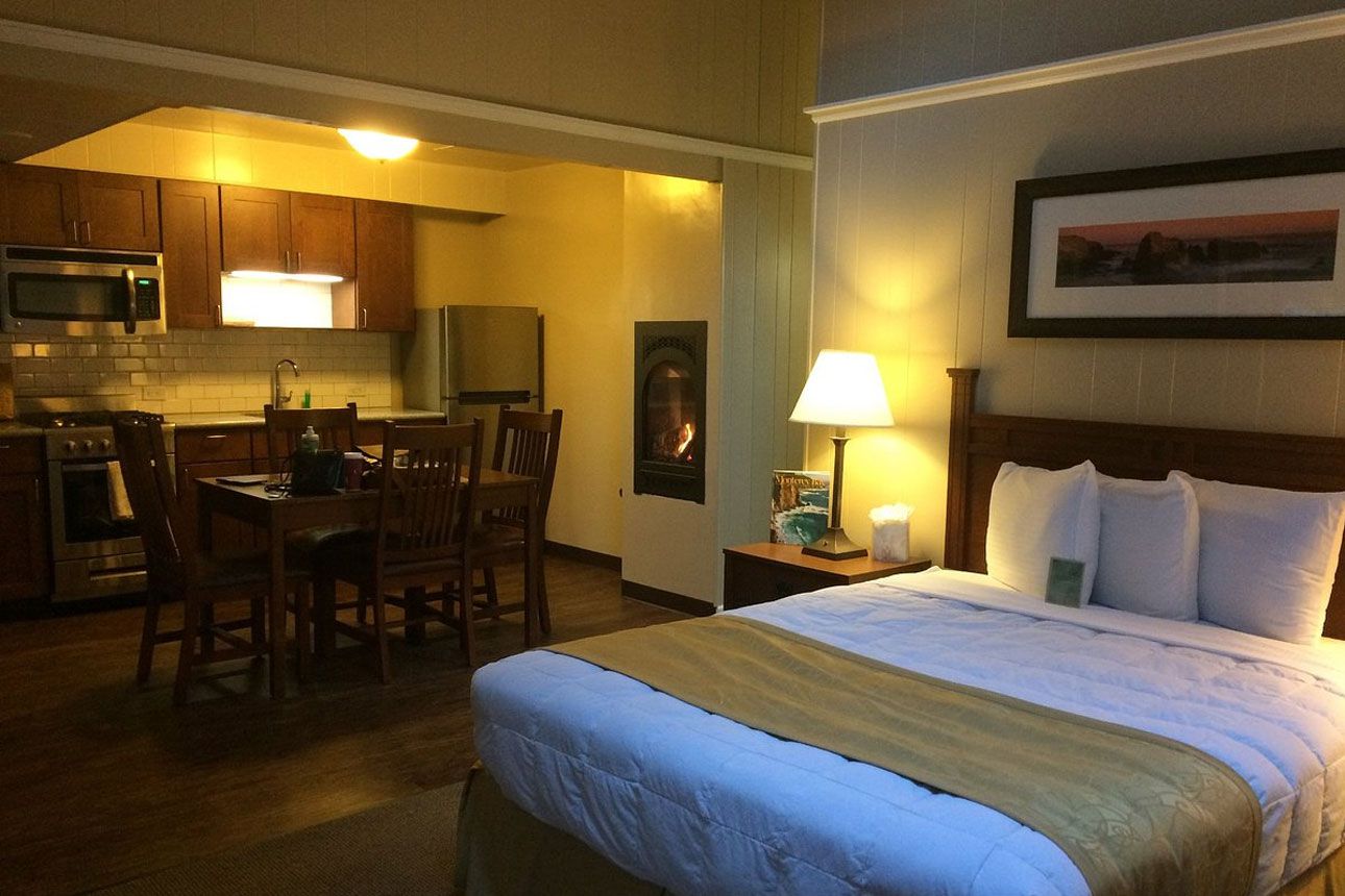 Fireplace And Kitchenette Cottage-bedroom.