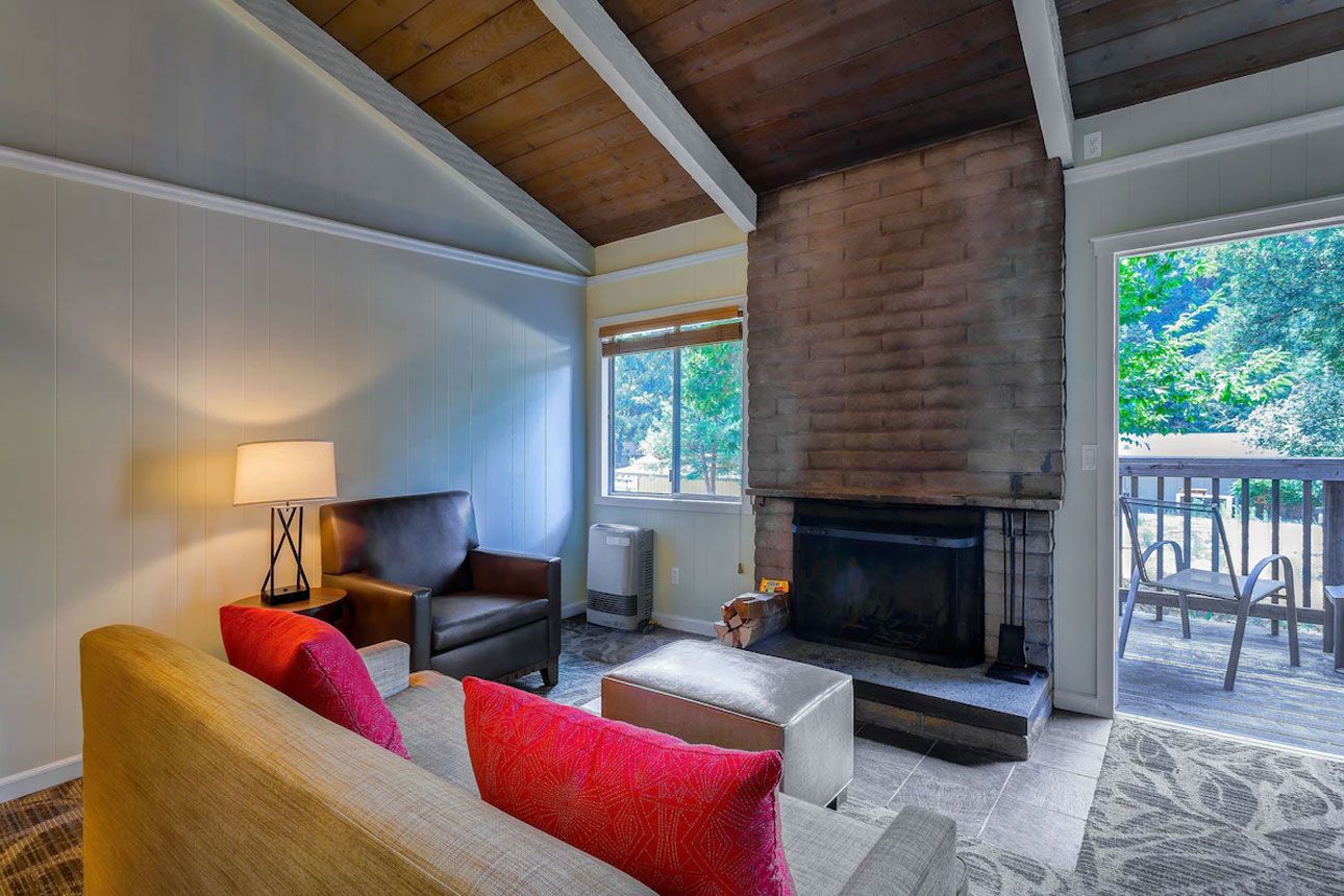 Fireplace And Kitchenette Cottage-living room..