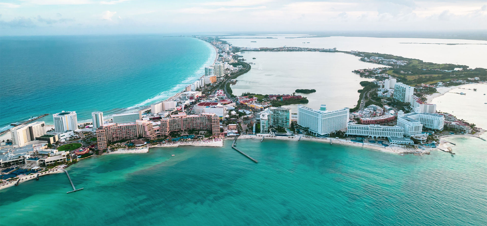 Puerto vallarta versus cancun beach with resorts.